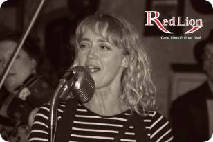 Becky Brine fronting the band with her amazing vocals! Hamer & Isaacs gypsy swing band and special guests at The Red Lion Newquay in Cornwall.
